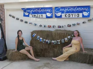 Emily & Kayla on Hay Bails at Graduation