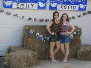 Emily and Madeline with Hay Bails