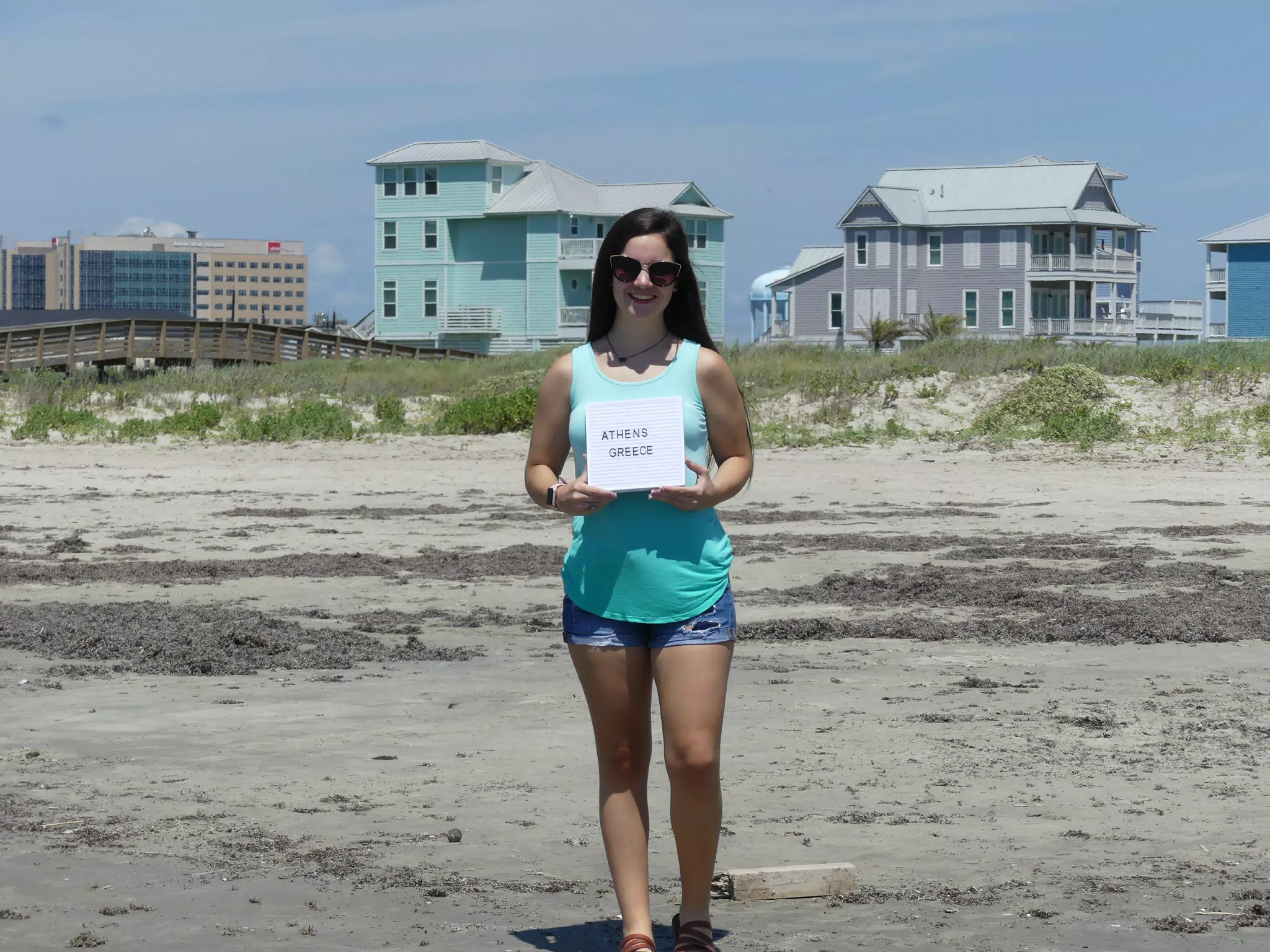 Teen Girl & Houses on Galveston Beach