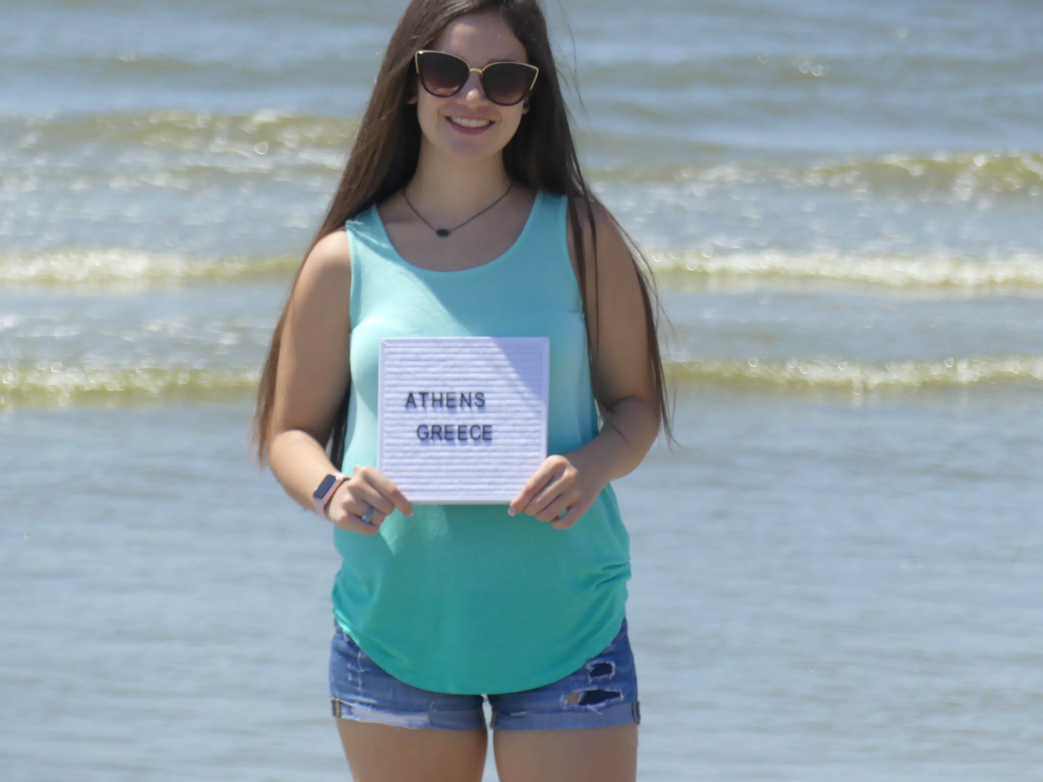 Emily Holding Athens Sign
