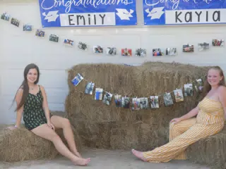 Emily and Kayla Posing at Graduation Party
