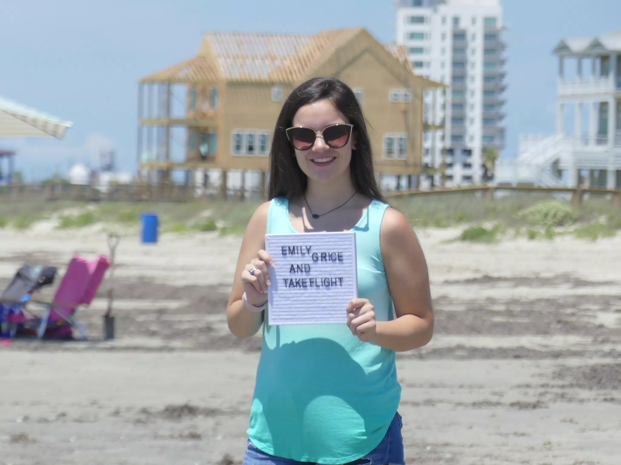 Emily Grice with TakeFlight Sign