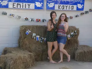 Emily & Madeline Barefoot with Hay Bails