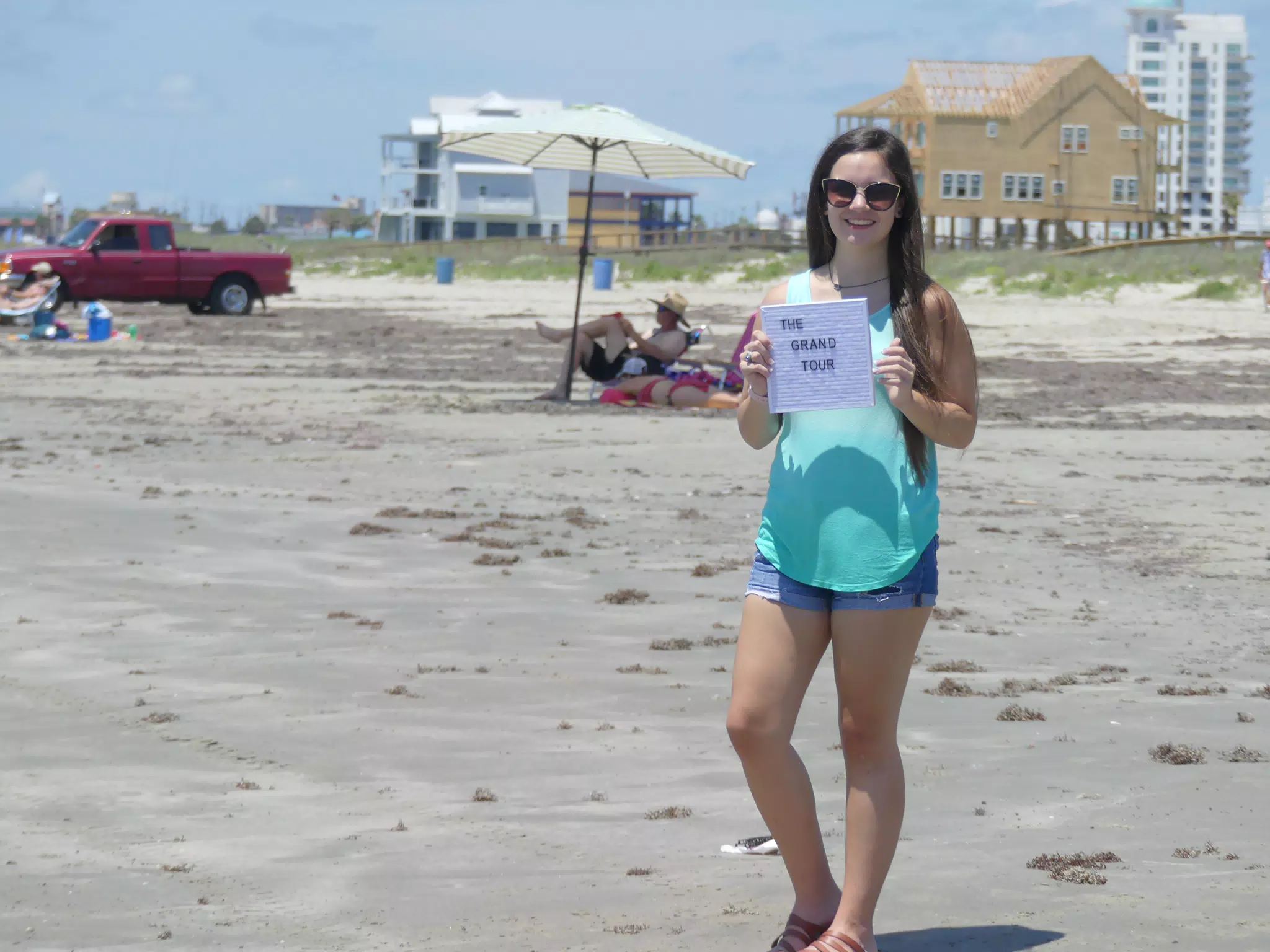 Teen Model Emily Brunette on Galveston Beach in Denim Shorts, Green, Sandals