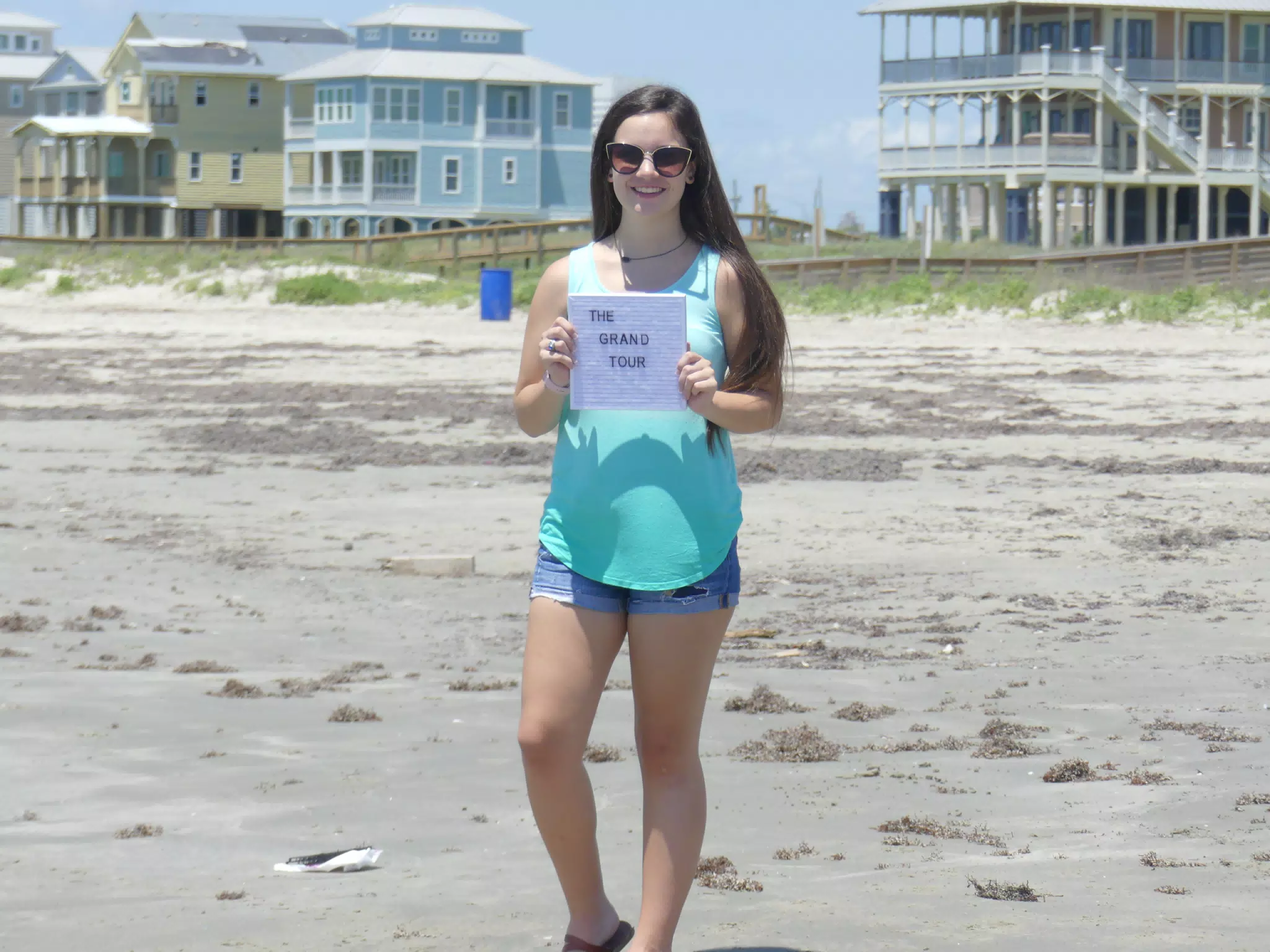 Brunette Teen Girl on Beach in Shorts