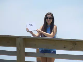 Emily with Rome Italy Sign in Galveston