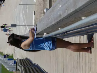 Emily on Boardwalk Working on Sign