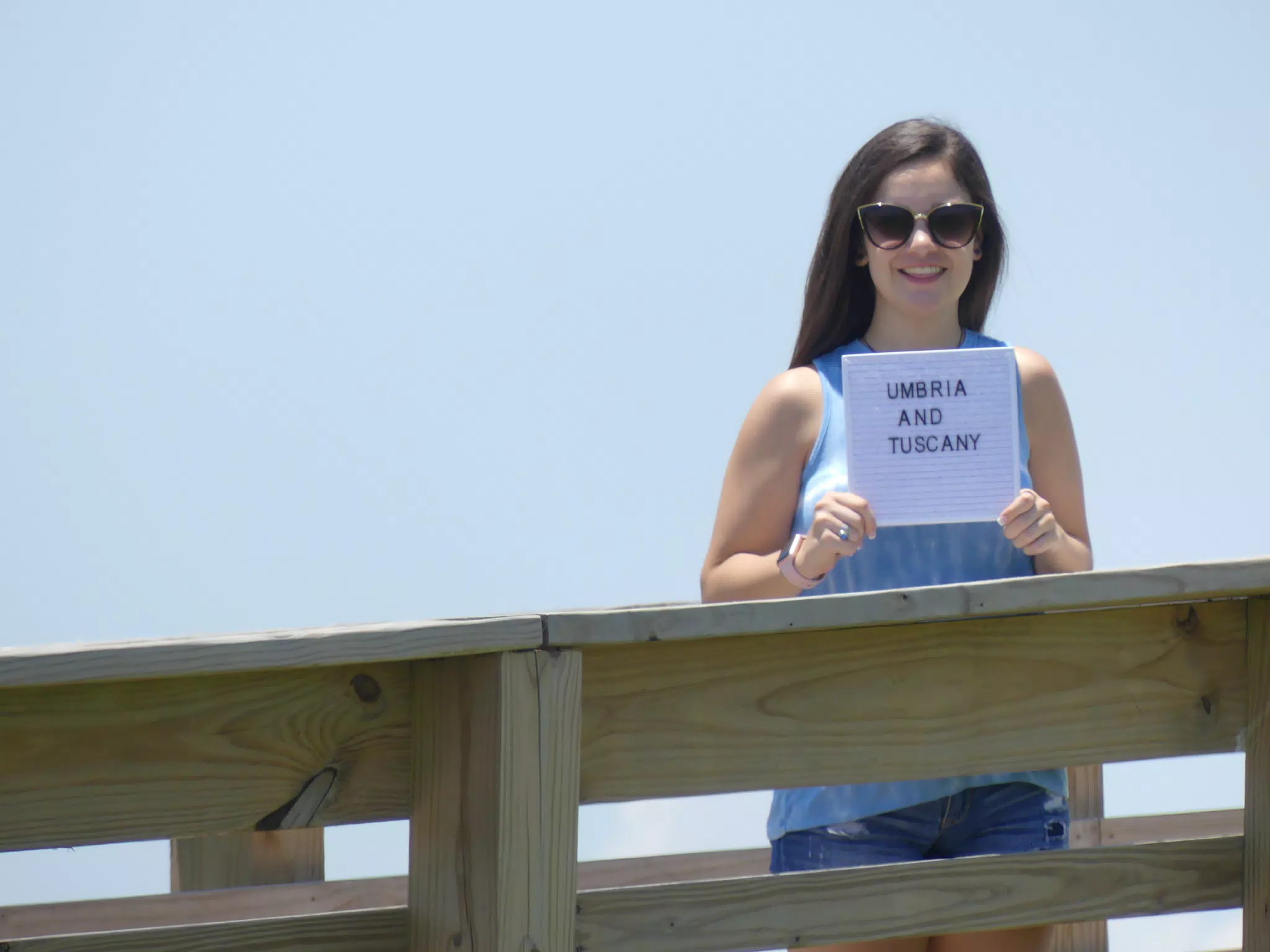 Emily with Tuscany Sign on Galveston