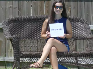 Emily Holding Switzerland Sign