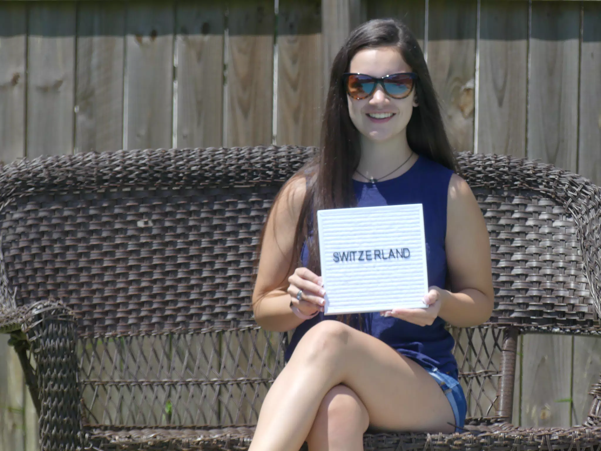 Emily Holding Switzerland Sign