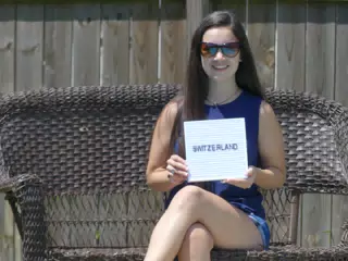 Emily Holding Switzerland Sign
