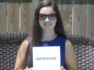 Emily with Switzerland Sign