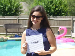 Laughing about Hangry Sign
