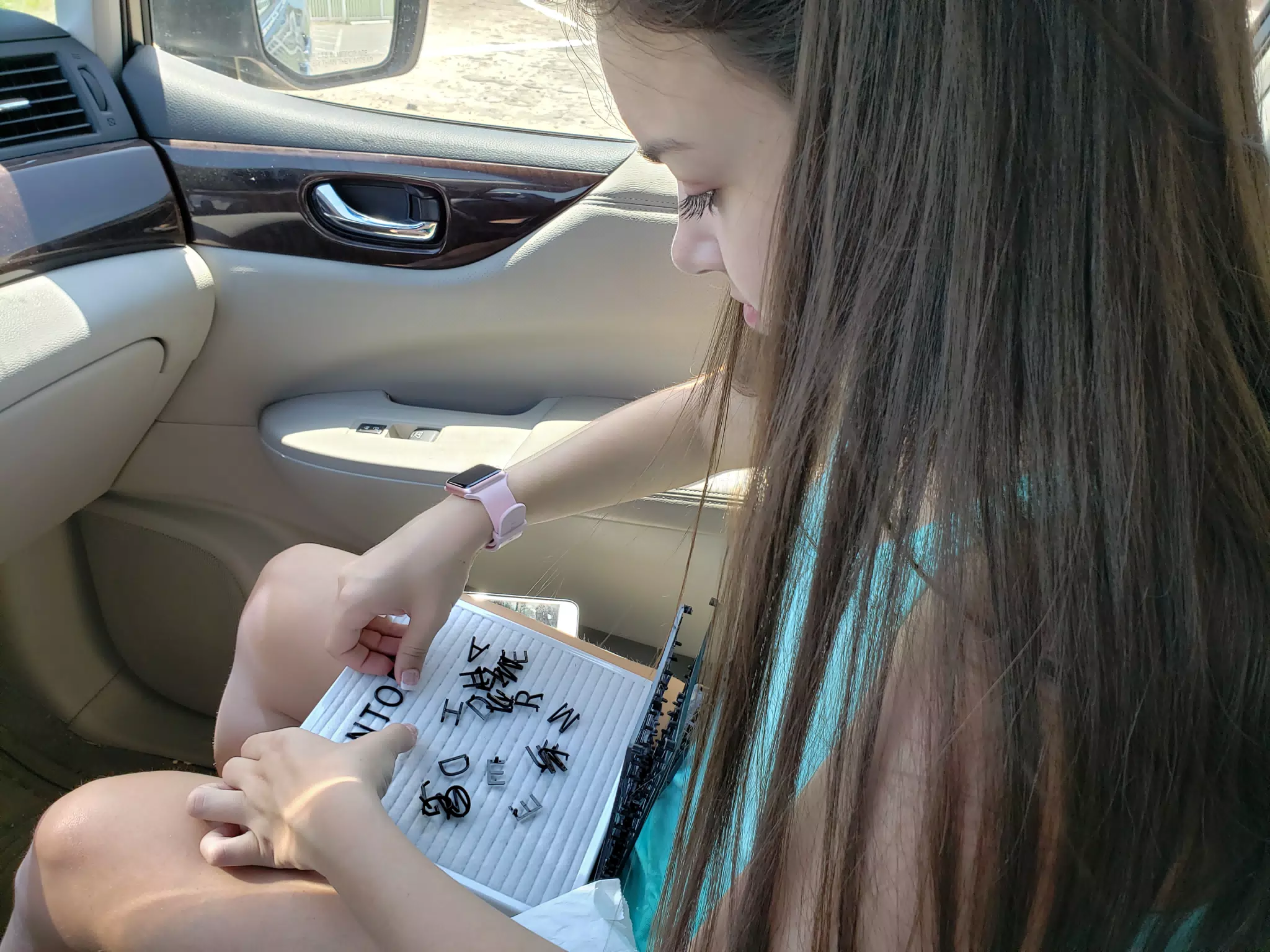 Emily Working on Sign Board