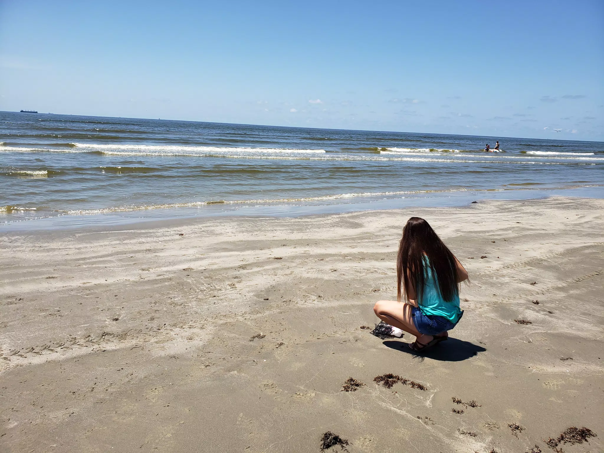 Emily on Galveston Beach Working on Sign
