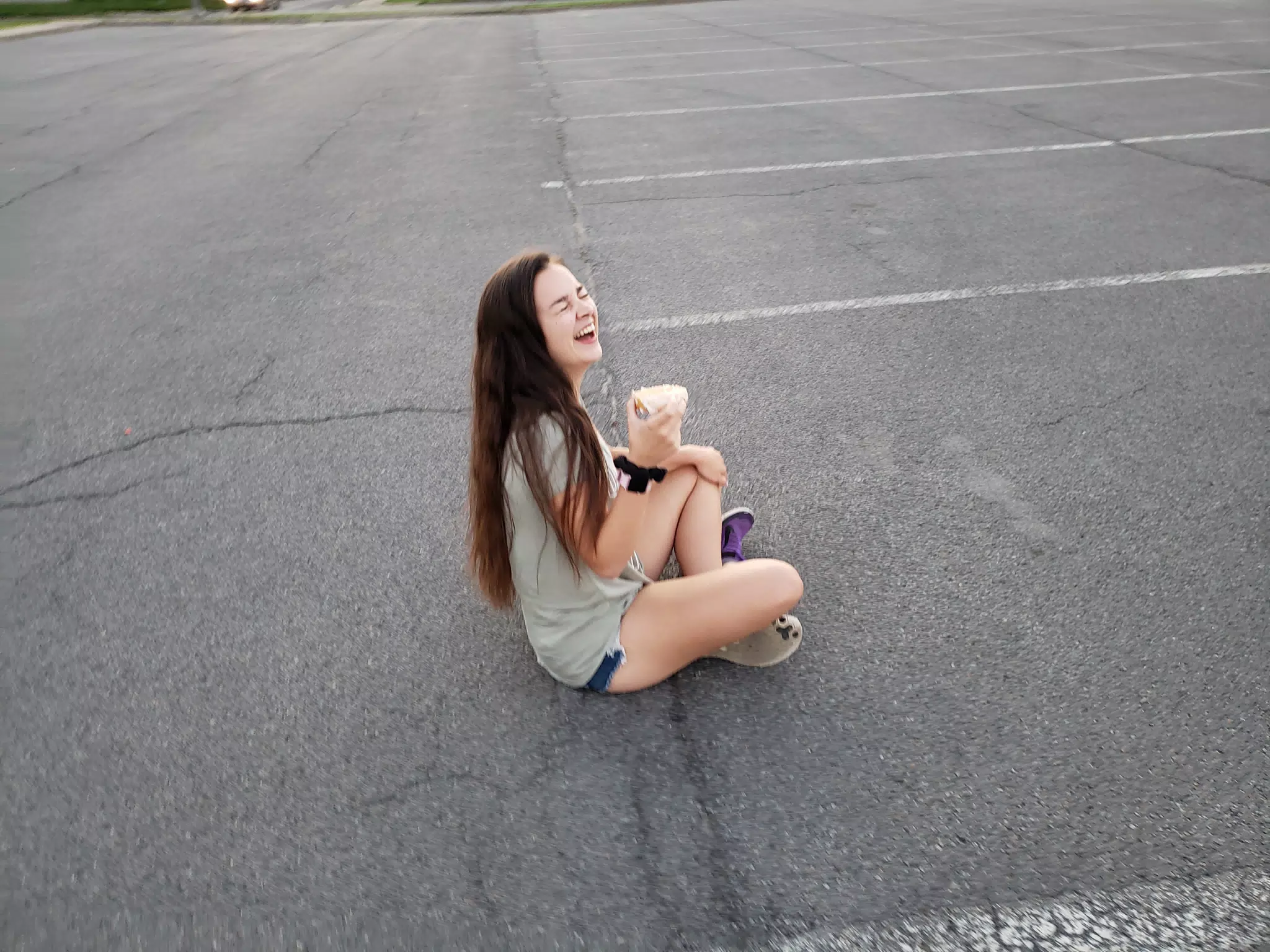 Emily Laughing with Donut on Ground