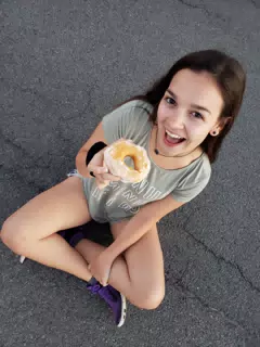 Emily Eating a Donut