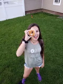 Emily Looking Through Doughnut