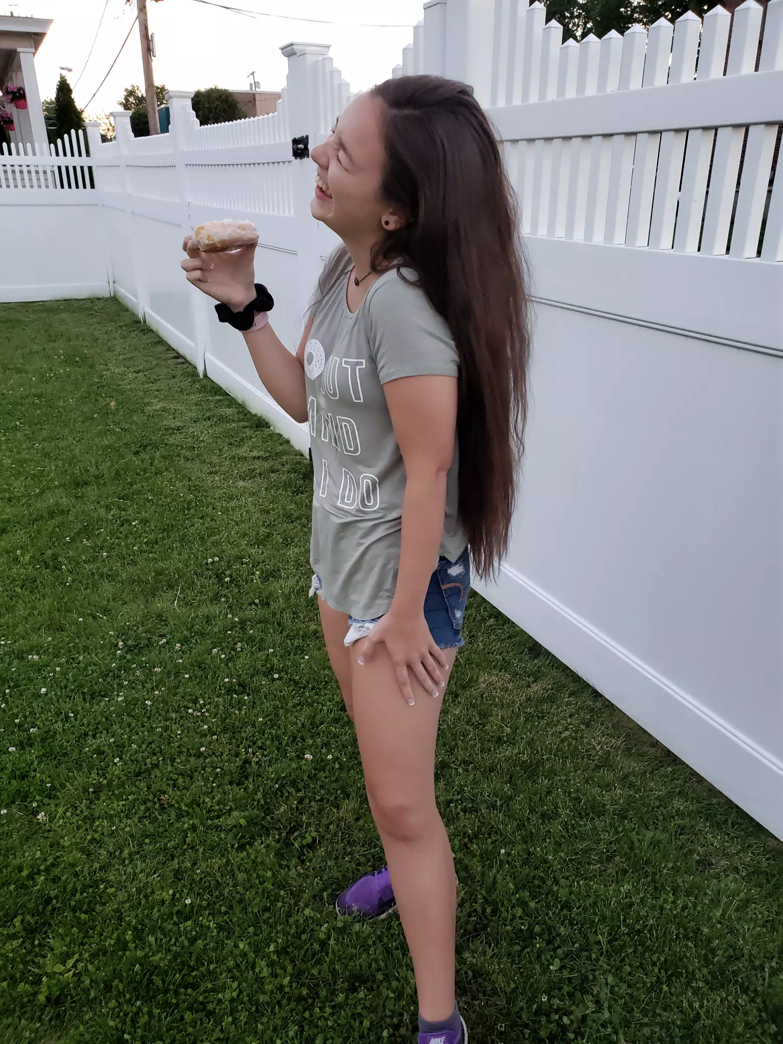 Emily Laughing with Doughnut