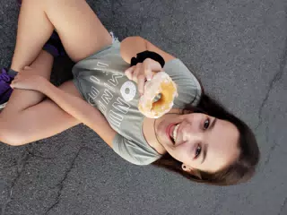 Emily Eating a Doughnut
