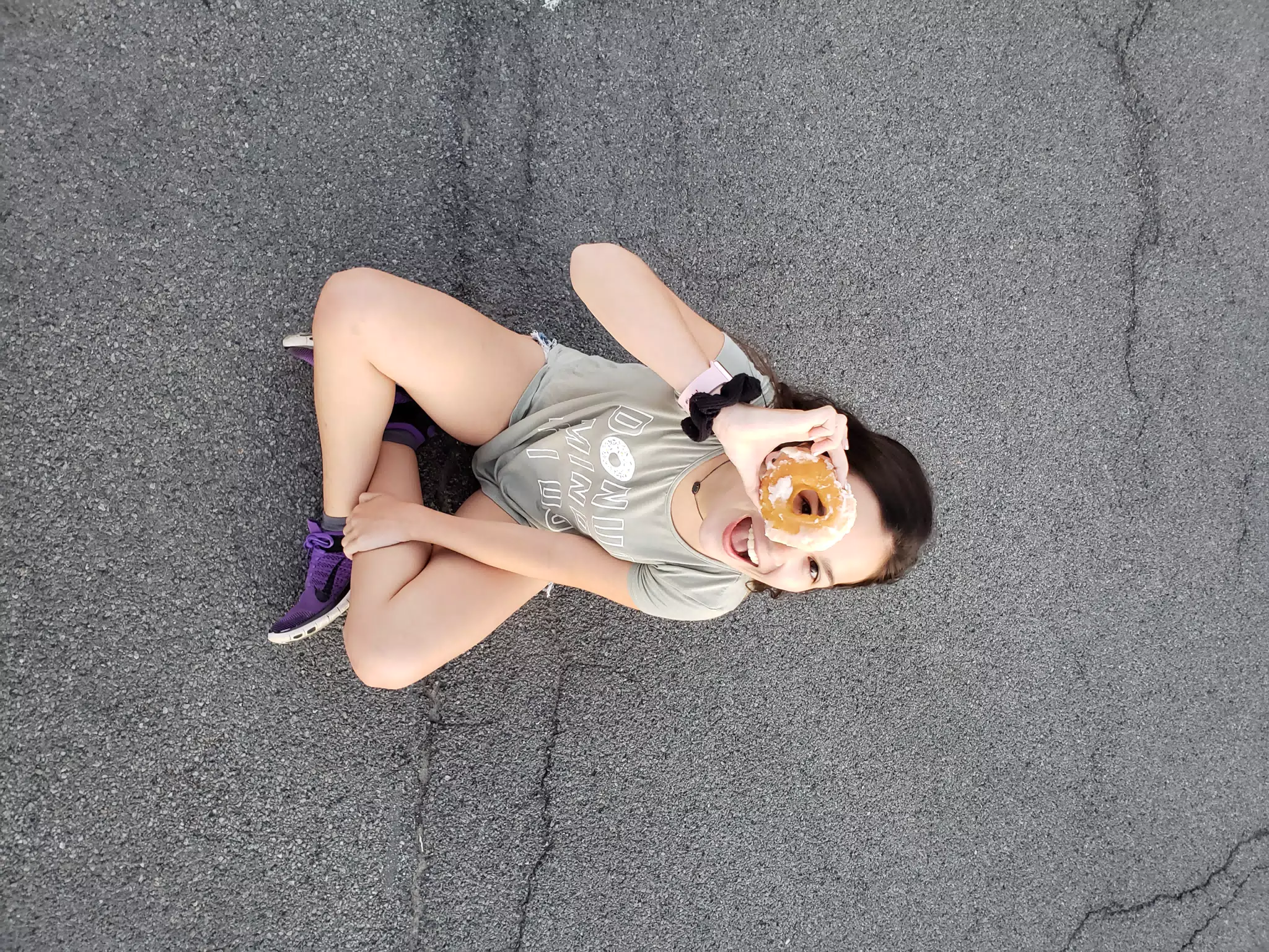 Emily Looking Through a Donut