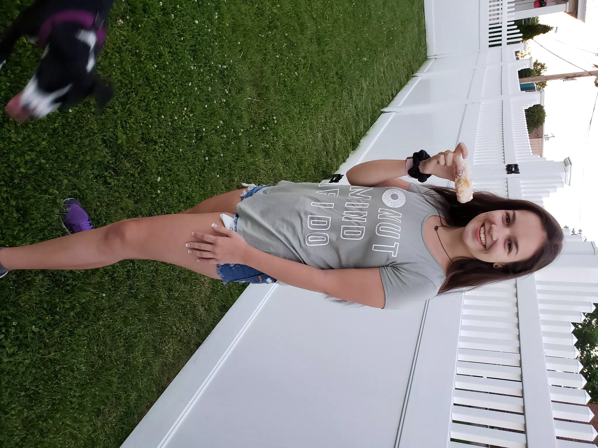 Emily by Fence with Donut