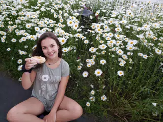 Girl with Flowers and Donut