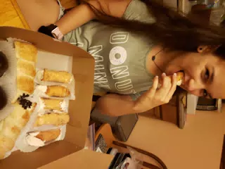 Emily Eating Canoli in Frankfort, New York