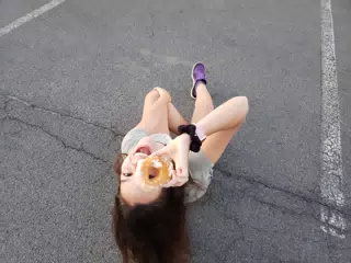 Emily Looking Through Donut Hole