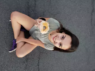 Emily Seated with a Donut
