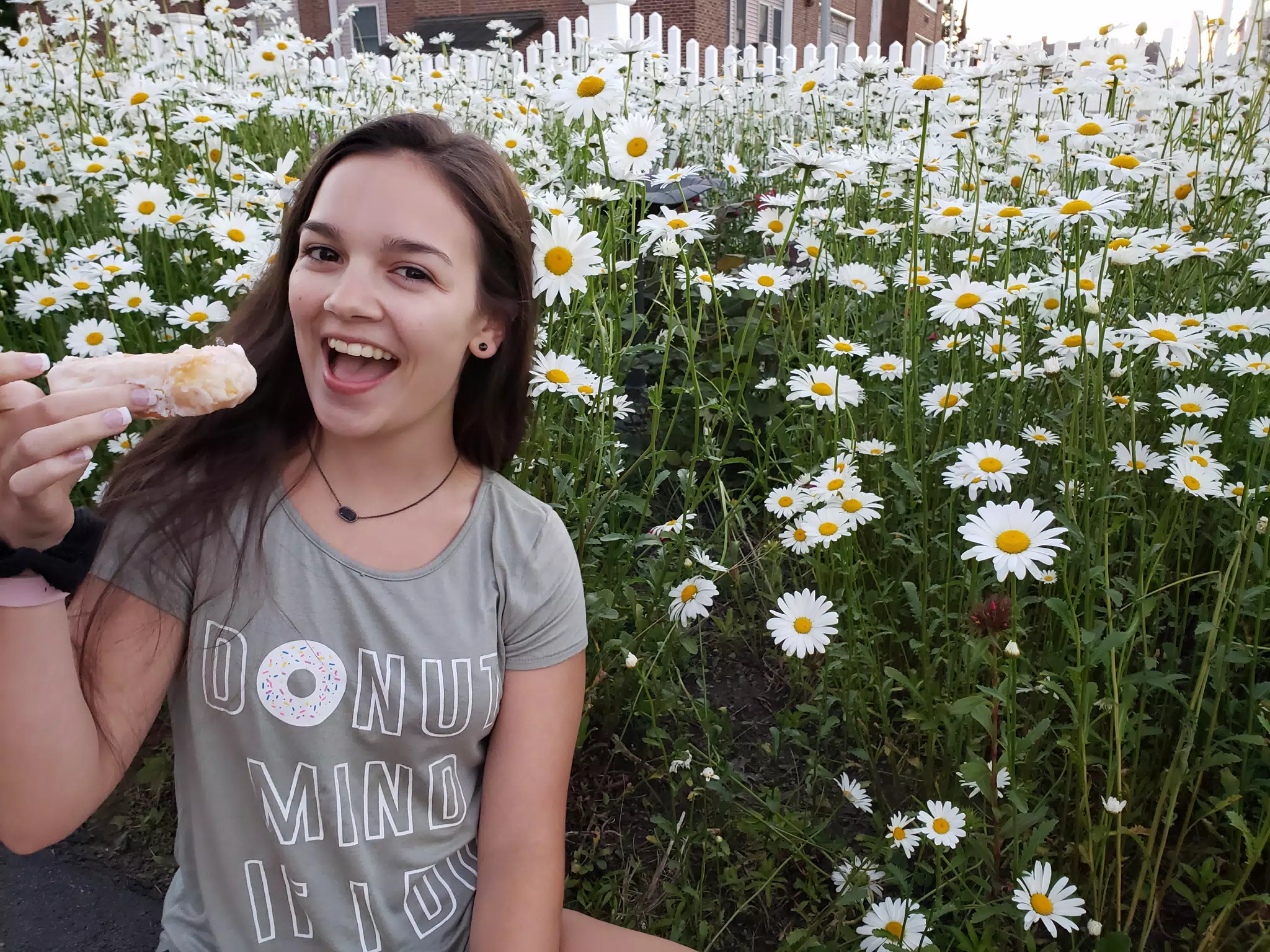 Emily with Doughnut and Flowers