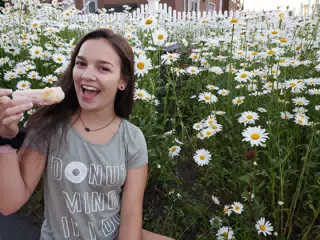 Emily with Doughnut and Flowers