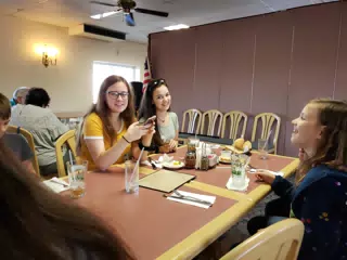 Madeline, Emily and Clara at Dinner the Night Before Big Trip