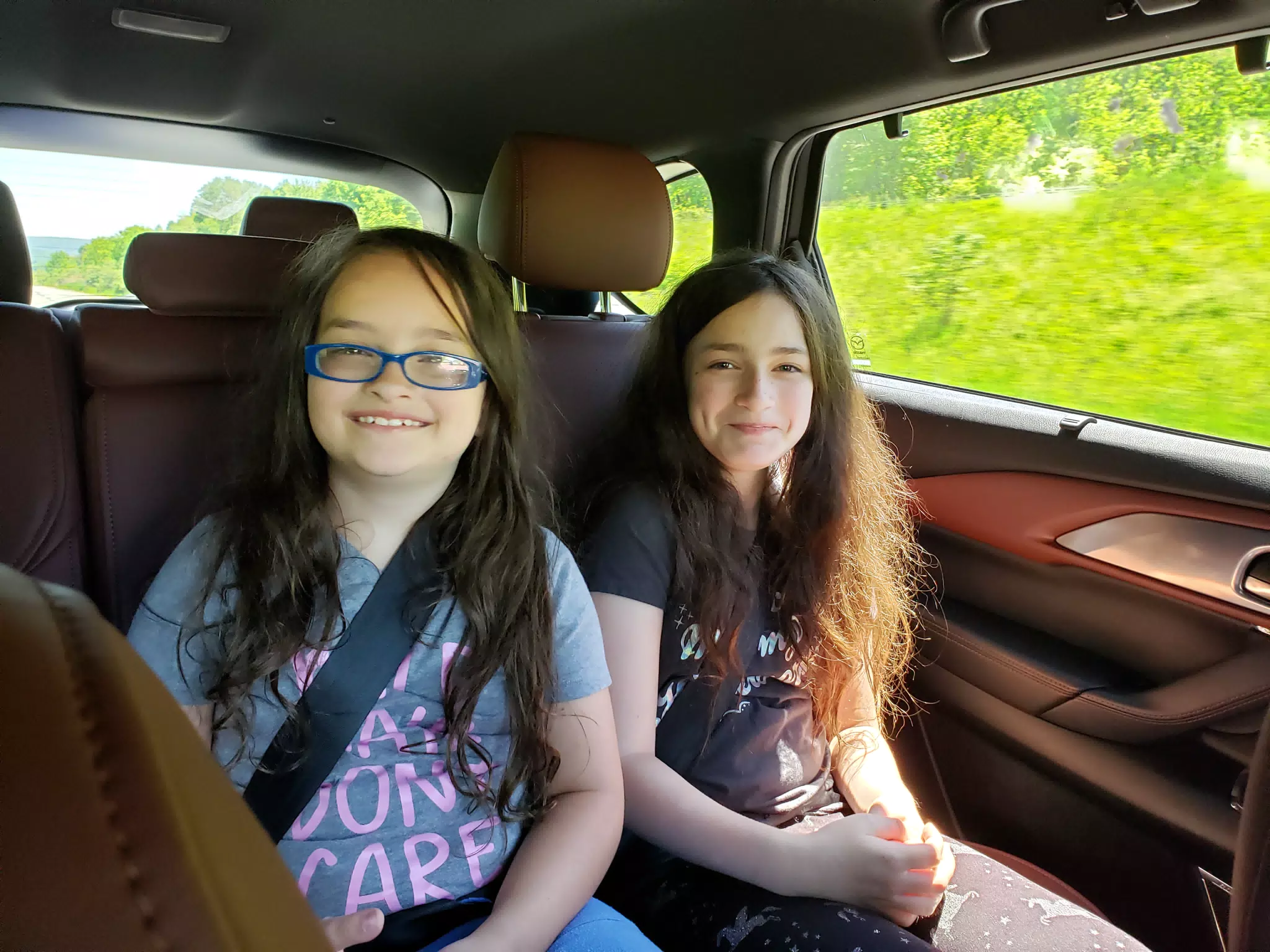 Luciana and Liesl Riding in the Mazda CX9 to the Masonic Home in Utica