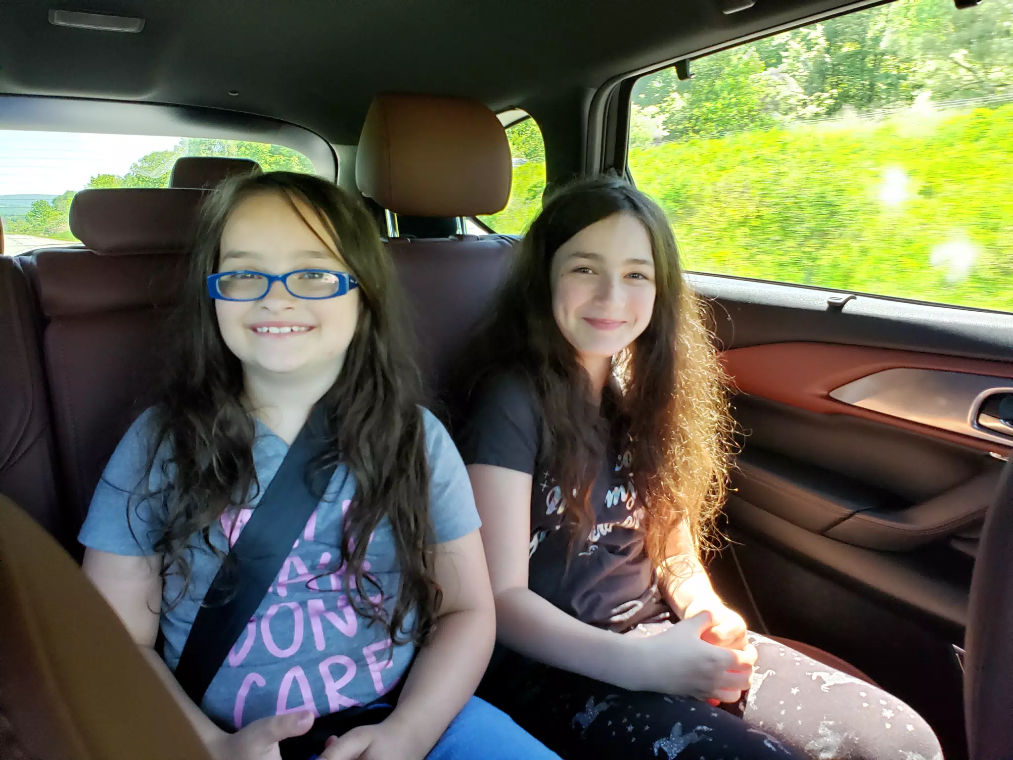 Luciana and Liesl Riding in the Mazda CX9 to the Masonic Home in Utica