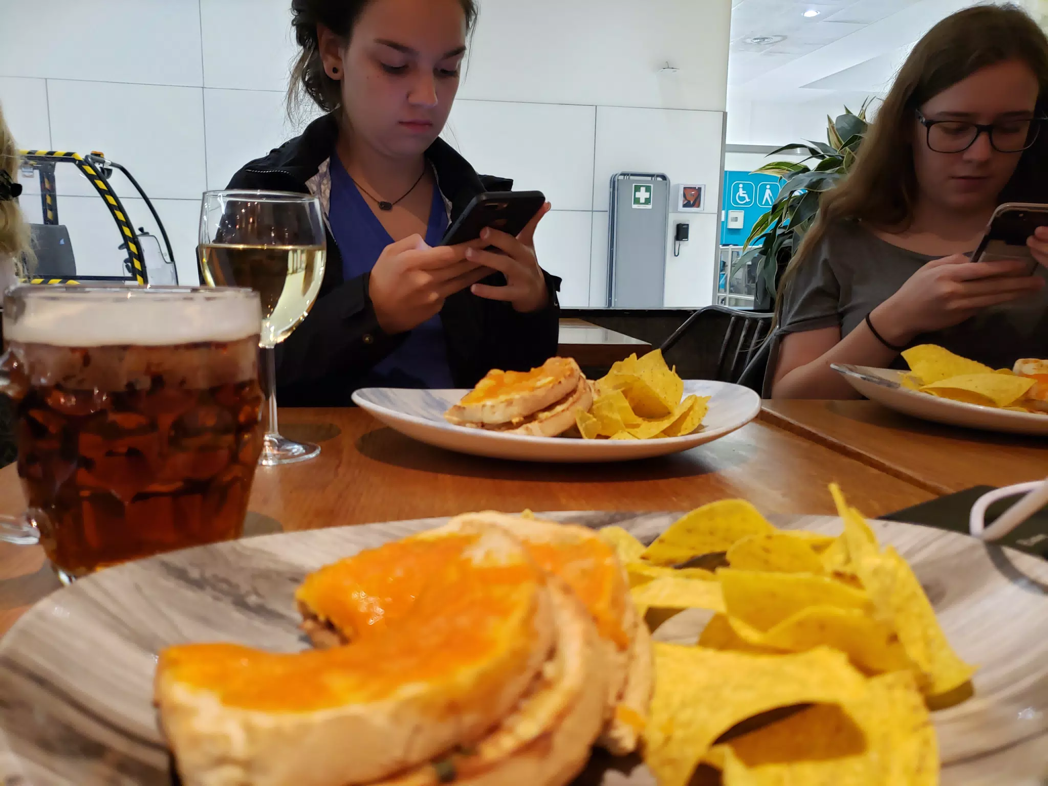 Glued to Devices at London Airport