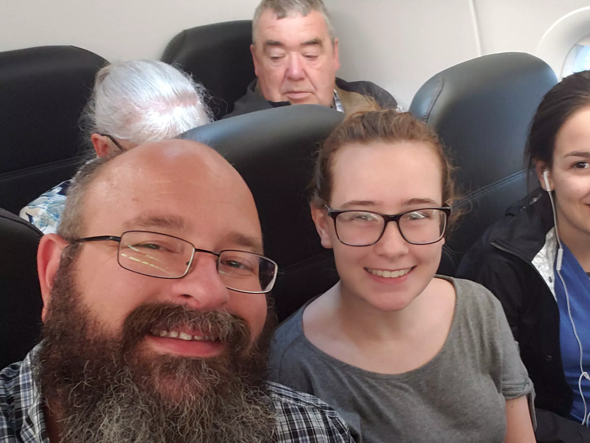 Scott, Madeline, & Emiy on Flight to Athens