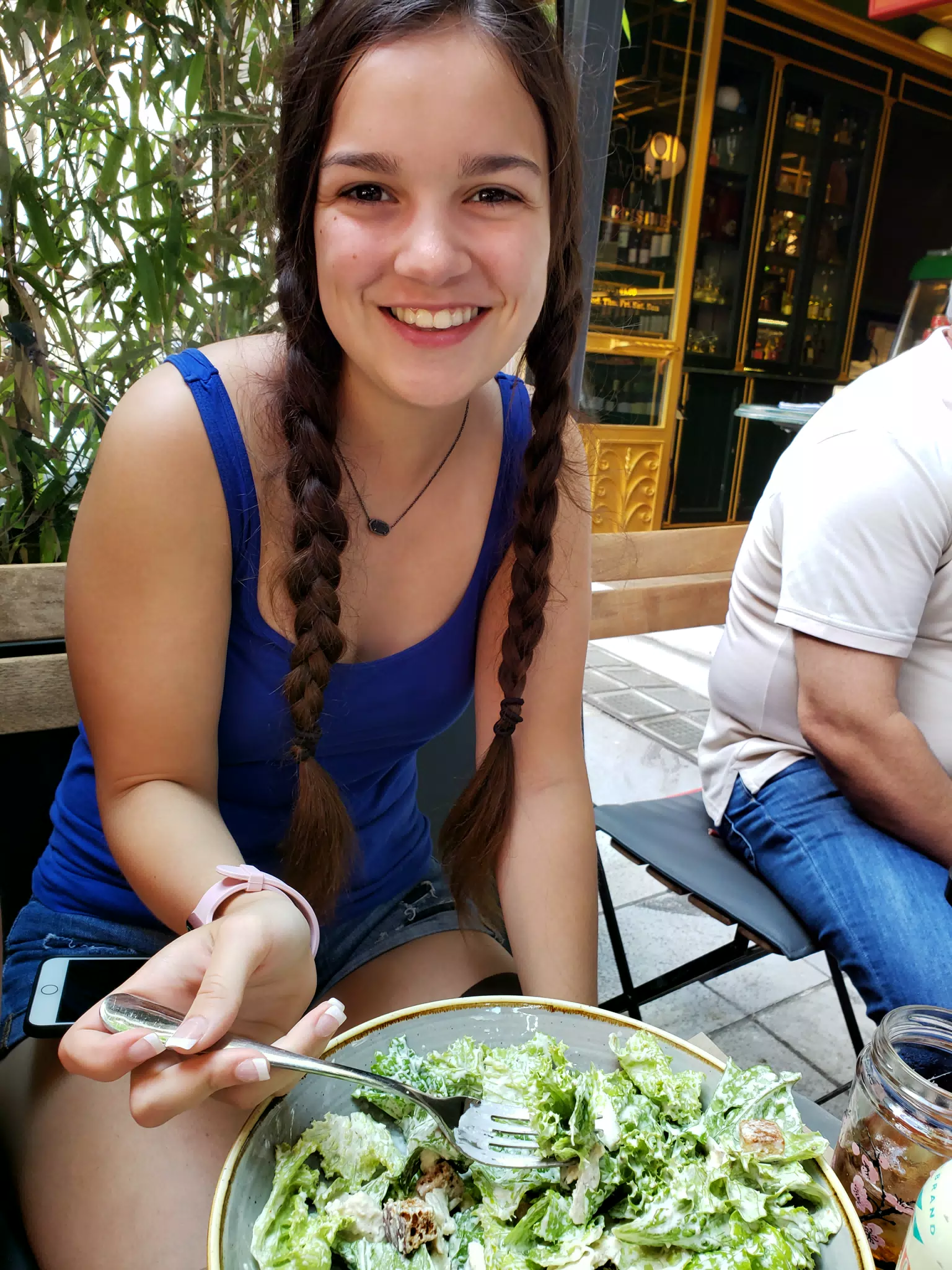 Emily Eating a Caesar Salad in Athens