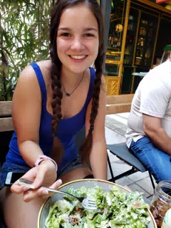 Emily Eating a Caesar Salad in Athens