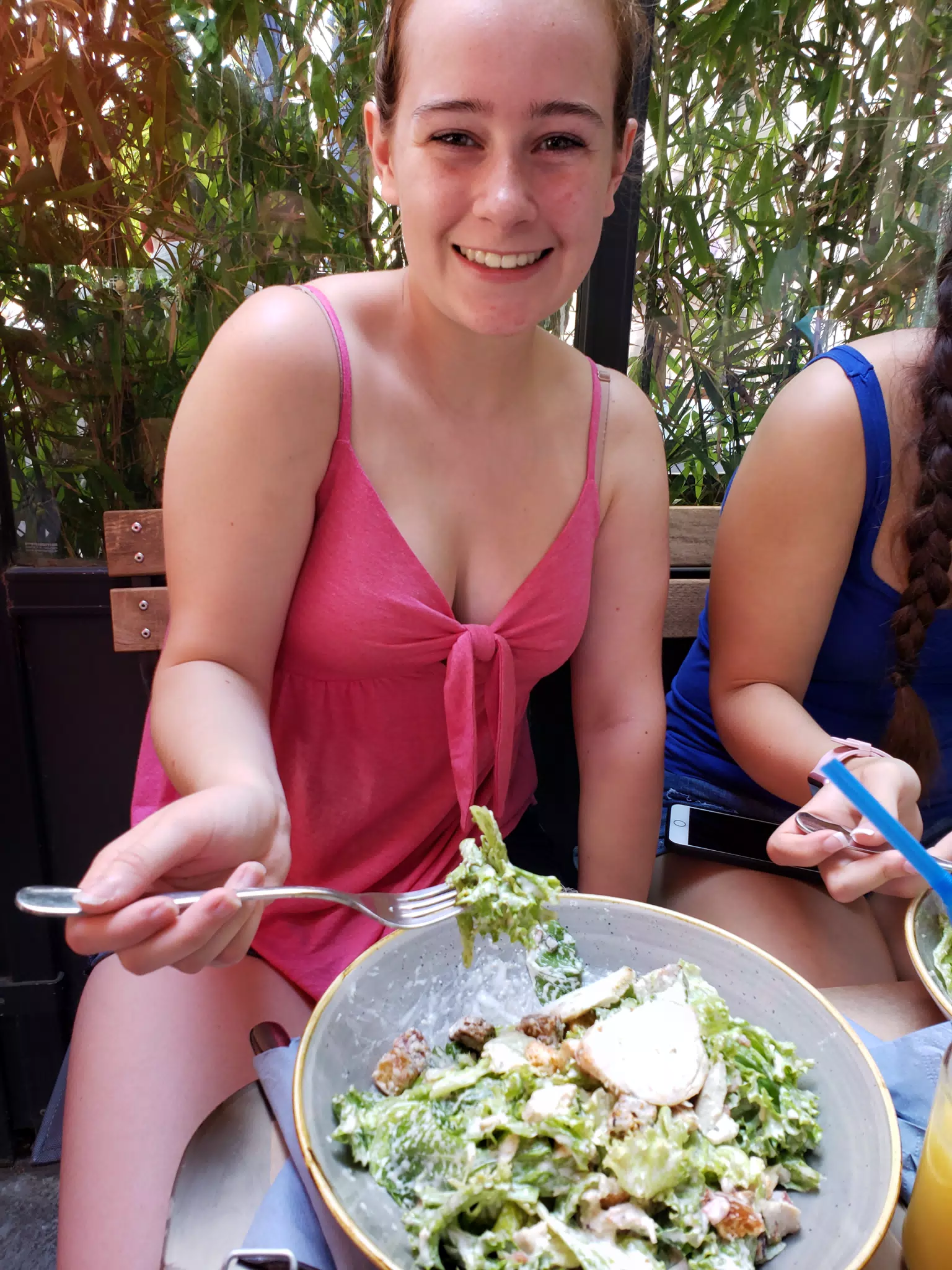 Madeline with a Ceasar Salad in Athens
