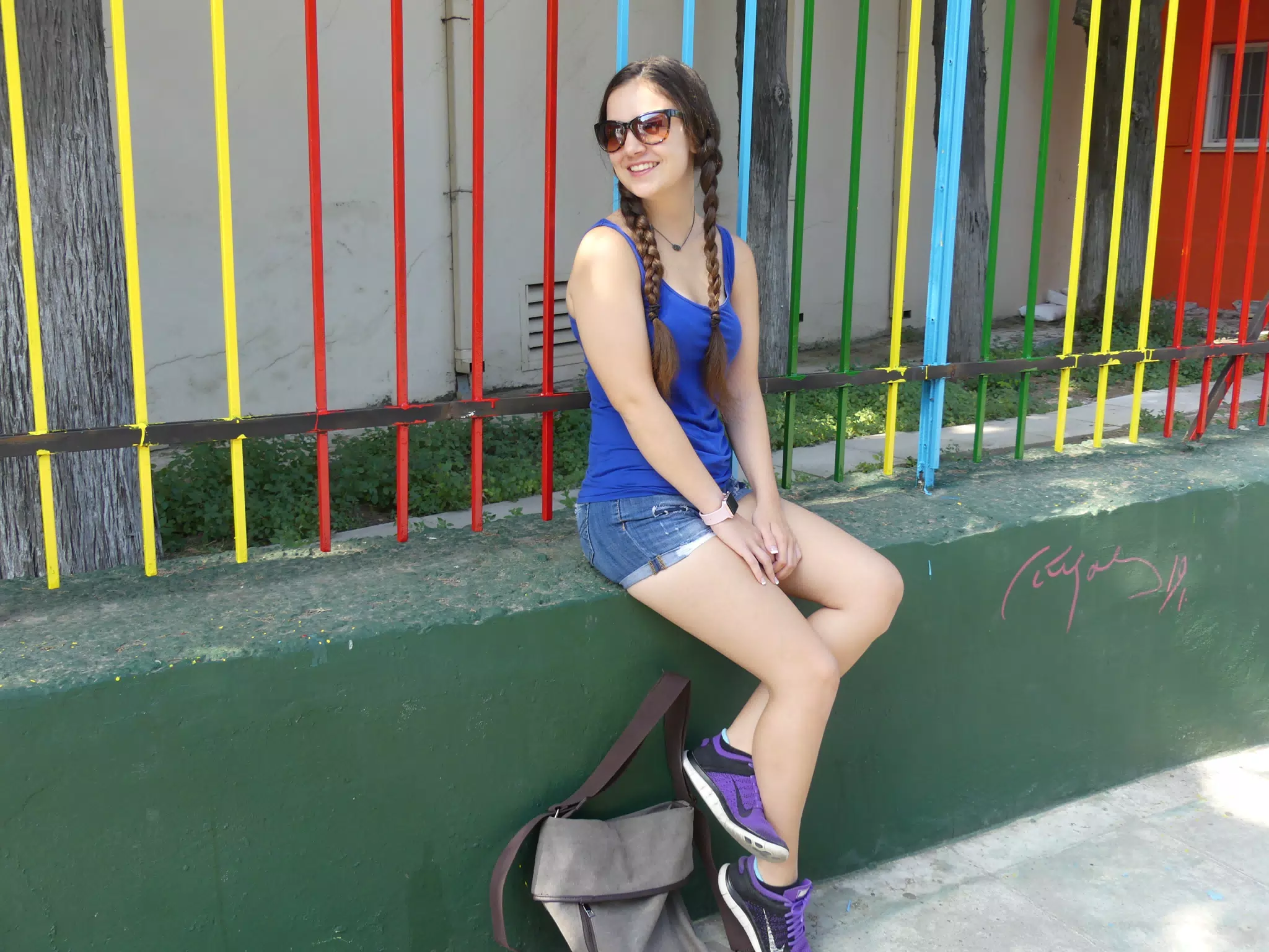 Emily in Front of Colorful Fence on Athens Street