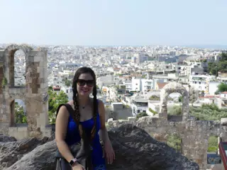 GIrl in Sunglasses on Acropolis over Athens