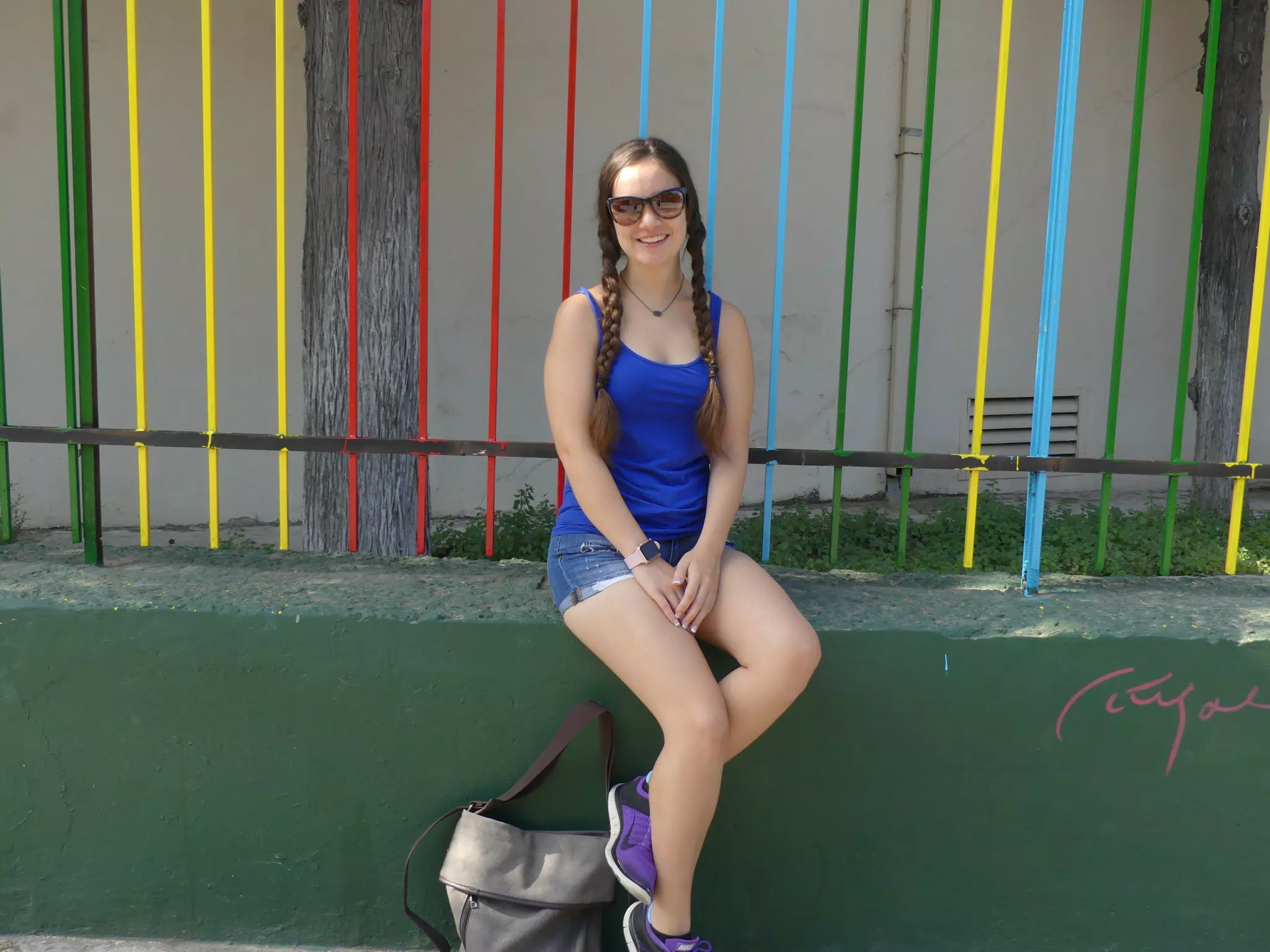 Girl on Low Wall, Pig Tails