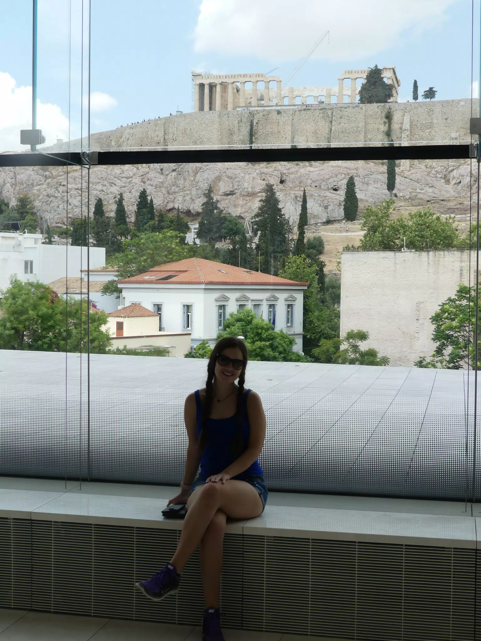 Girl with Parthenon in Museum Windows