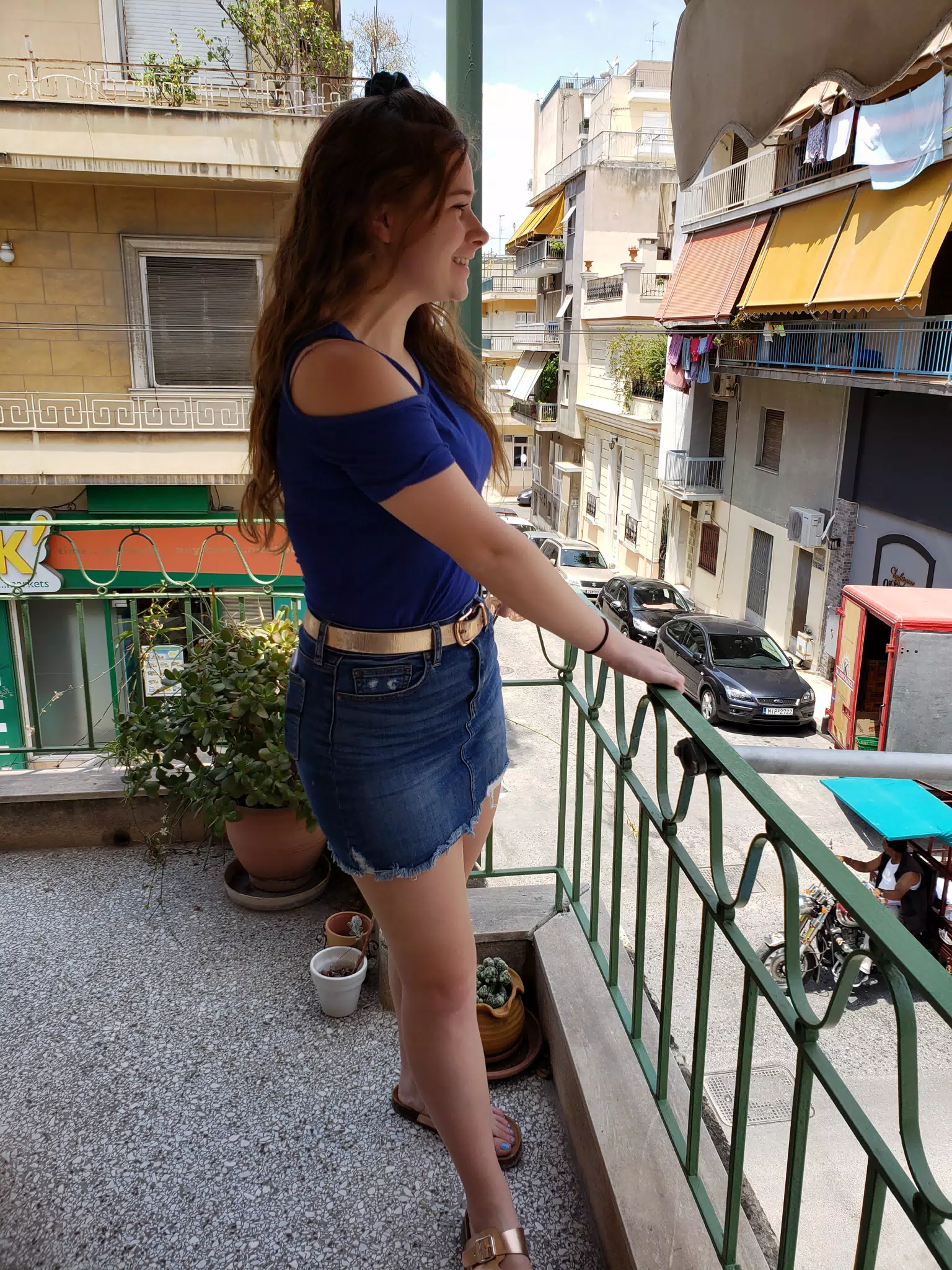 Girl in Skirt on Athens Balcony