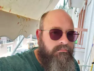 Scott on the Balcony in Athens