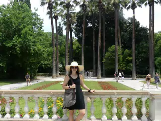 Emily in Hat and Black Dress in Athens Park