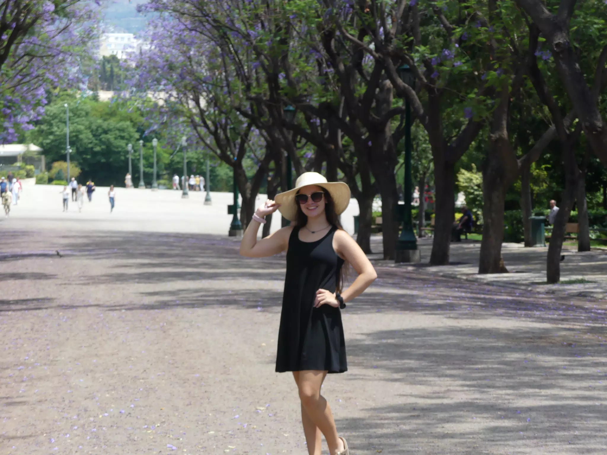 Girl in Hat and Black Dress in National Garden in Athens