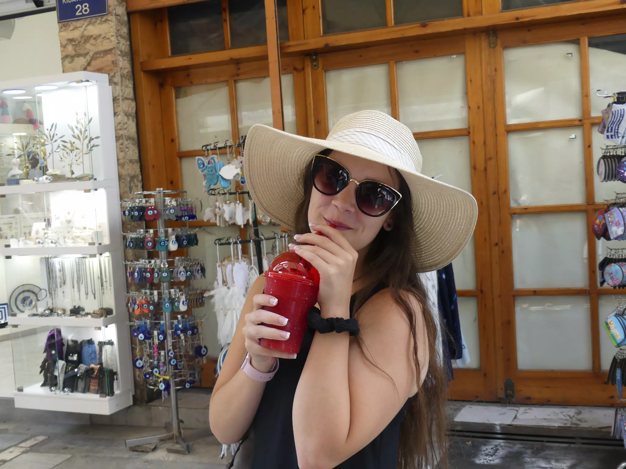 Emily Drinking Dessert in Athens