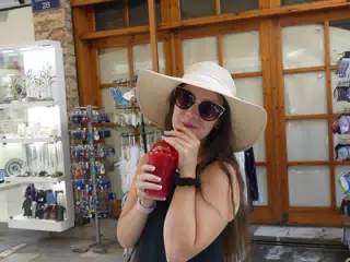 Emily Drinking Dessert in Athens